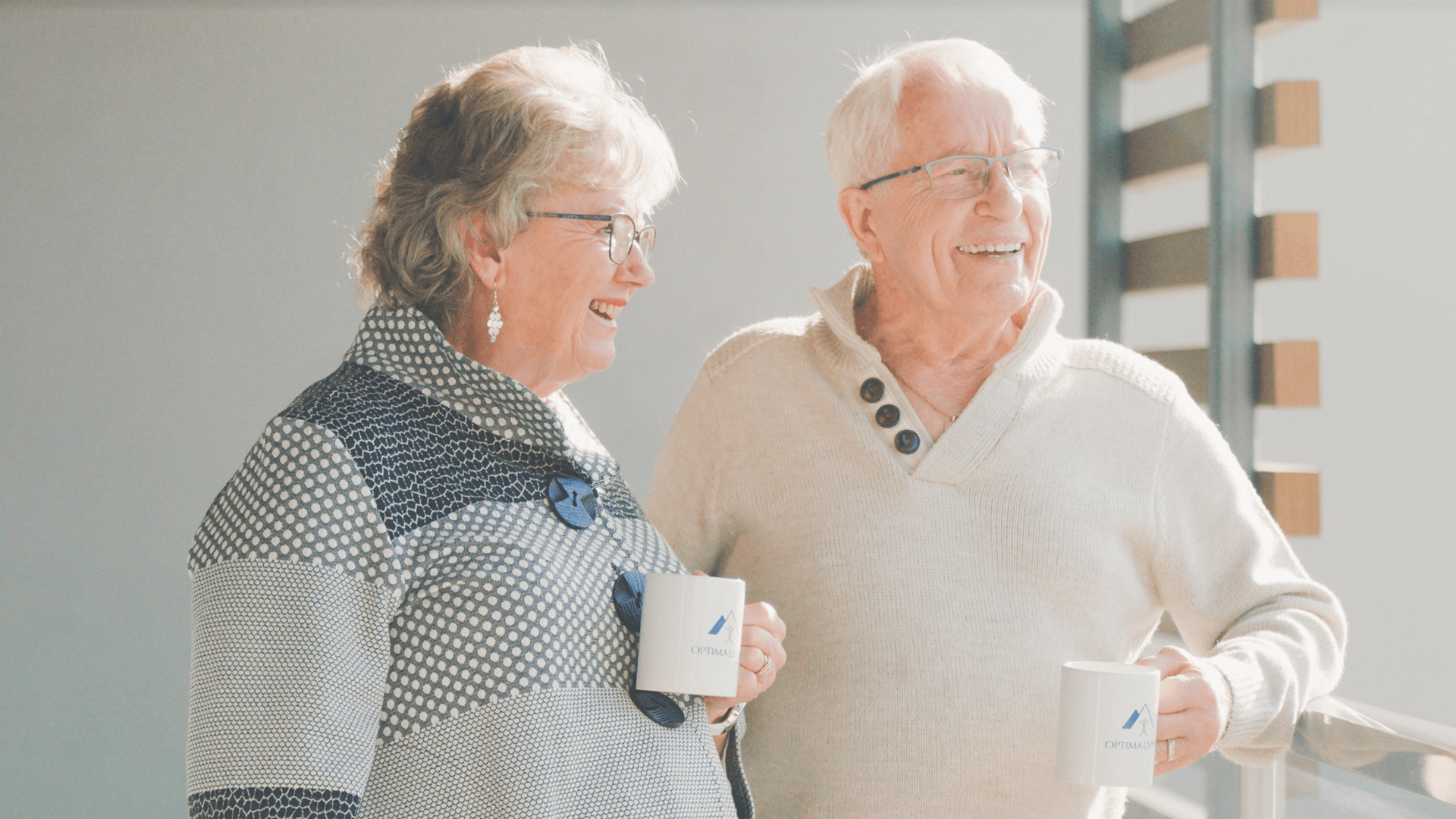 A man and woman enjoying coffee in independent living for seniors